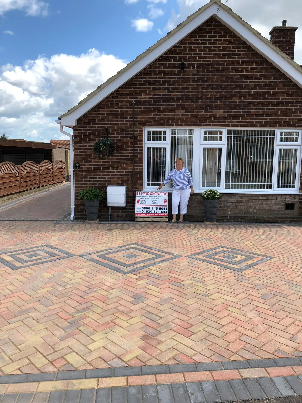 Herringbone block paved driveway with diamond detailing
